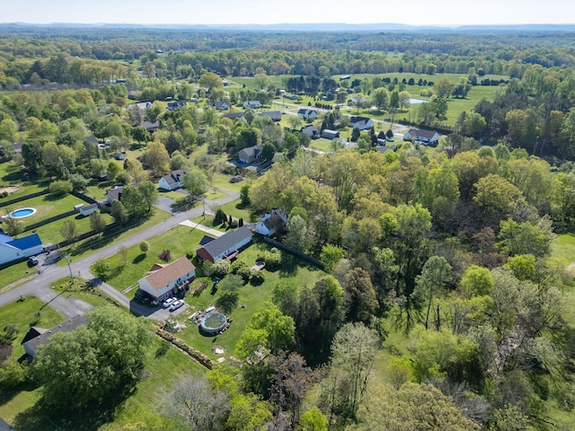 bird's eye view featuring a view of trees