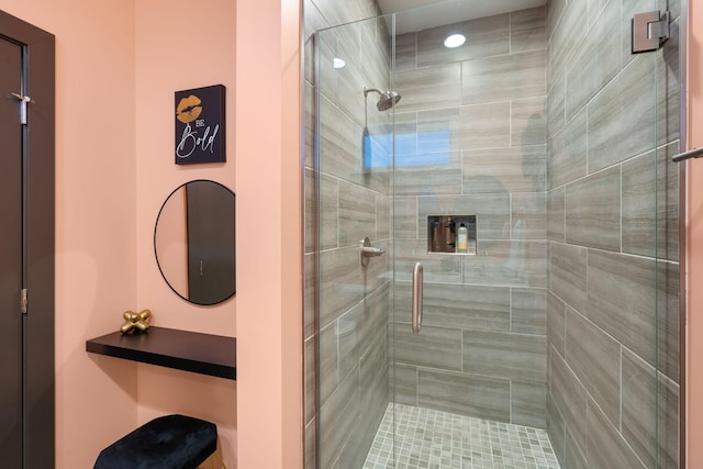 full bathroom featuring a shower stall