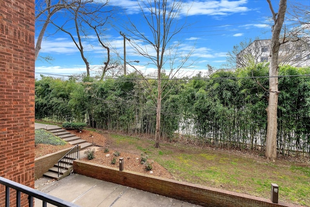 view of yard featuring stairway