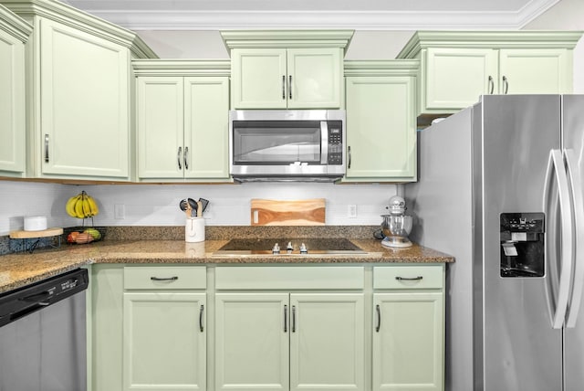 185 Kildeer Dr, Clarksville, TN 37040 - kitchen featuring green cabinets, appliances with stainless steel finishes, dark stone countertops, and backsplash