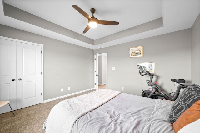 185 Kildeer Dr, Clarksville, TN 37040 - carpeted bedroom with a tray ceiling, baseboards, and a ceiling fan