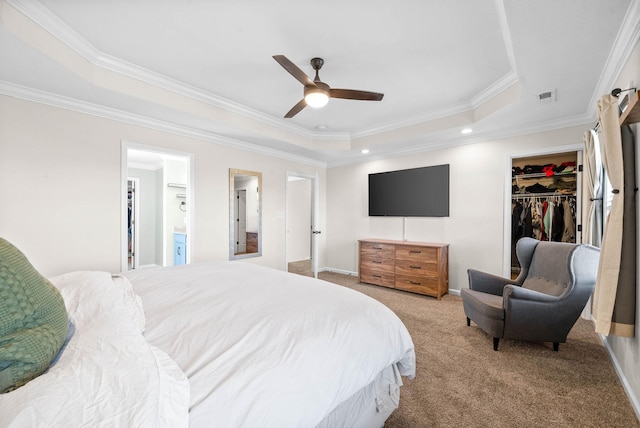185 Kildeer Dr, Clarksville, TN 37040 - carpeted bedroom featuring crown molding, a spacious closet, a raised ceiling, visible vents, and a closet