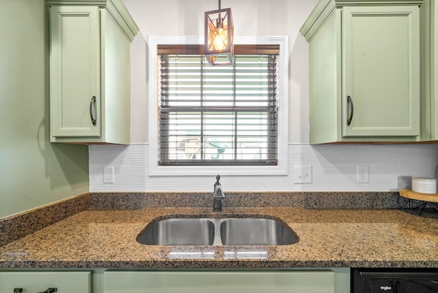 185 Kildeer Dr, Clarksville, TN 37040 - kitchen featuring green cabinetry, a sink, tasteful backsplash, decorative light fixtures, and dark stone counters