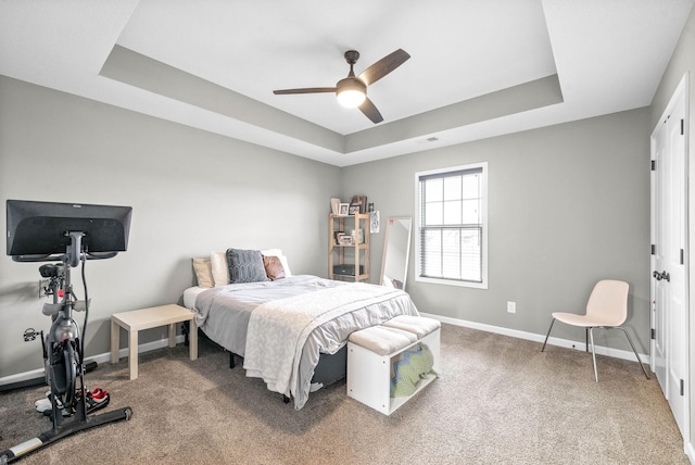 185 Kildeer Dr, Clarksville, TN 37040 - bedroom with visible vents, carpet, baseboards, a ceiling fan, and a tray ceiling
