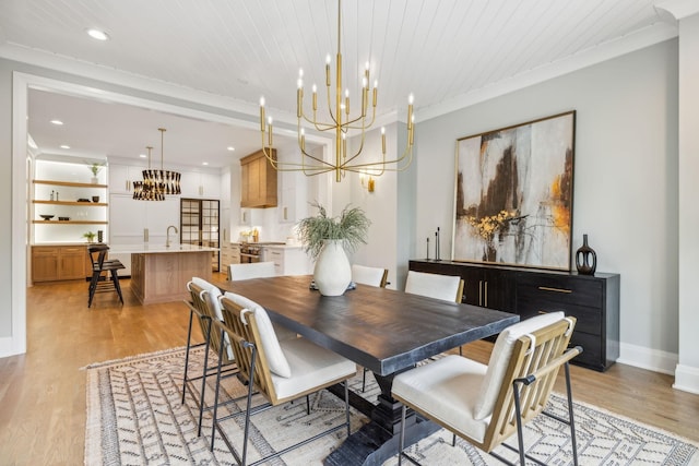 dining room featuring a chandelier, baseboards, recessed lighting, light wood-type flooring, and wood ceiling