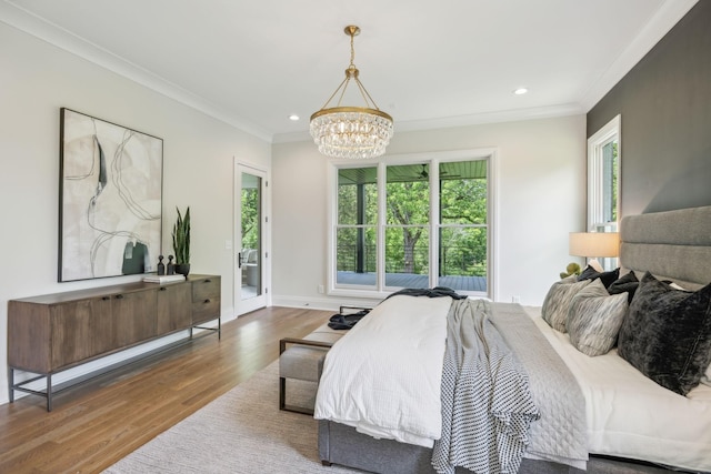 bedroom with crown molding, a chandelier, wood finished floors, access to outside, and recessed lighting