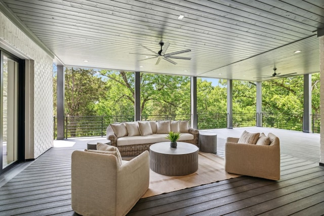 exterior space with an outdoor living space and ceiling fan