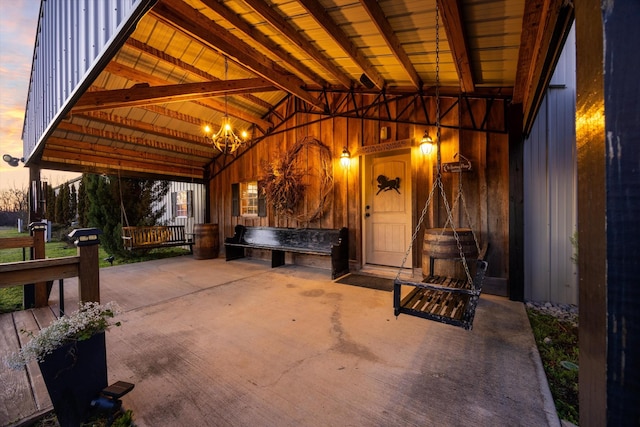 view of patio terrace at dusk