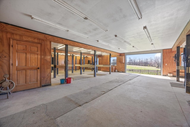 interior space featuring wood walls