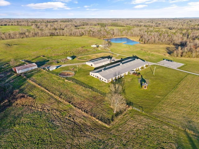 drone / aerial view featuring a water view and a rural view