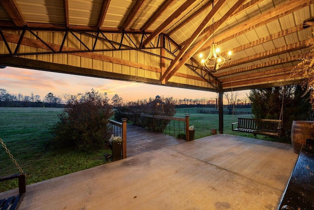 patio terrace at dusk featuring a gazebo