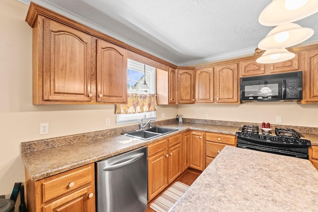 kitchen featuring light countertops, a sink, a textured ceiling, light wood-type flooring, and black appliances