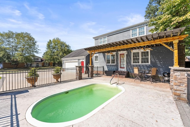 view of swimming pool featuring a patio area, fence, an outdoor structure, a pergola, and entry steps