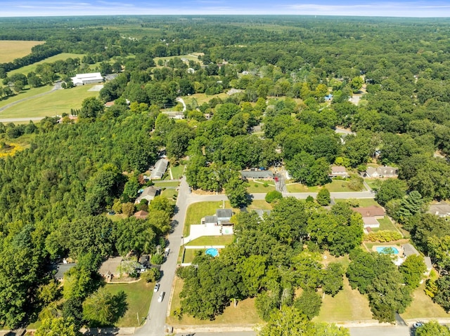 aerial view featuring a view of trees