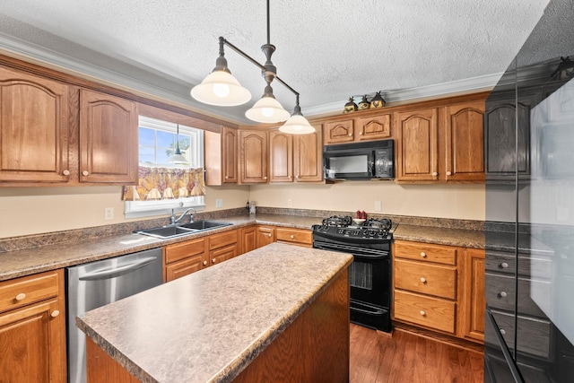 kitchen with a sink, a center island, brown cabinetry, black appliances, and dark wood-type flooring