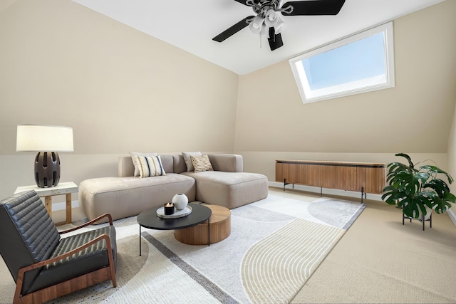 100 Carriage Way, Hendersonville, TN 37075 - living area featuring a ceiling fan, a skylight, light carpet, vaulted ceiling, and baseboards