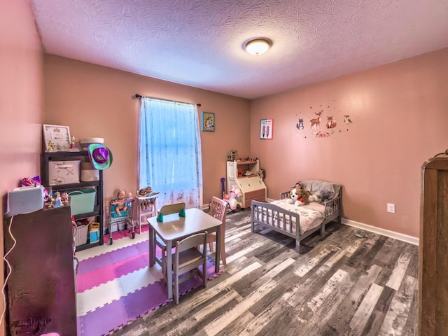5113 Highland Lick Rd, Lewisburg, KY 42256 - bedroom with baseboards, wood finished floors, and a textured ceiling
