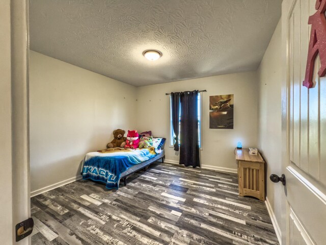 5113 Highland Lick Rd, Lewisburg, KY 42256 - bedroom with baseboards, wood finished floors, and a textured ceiling