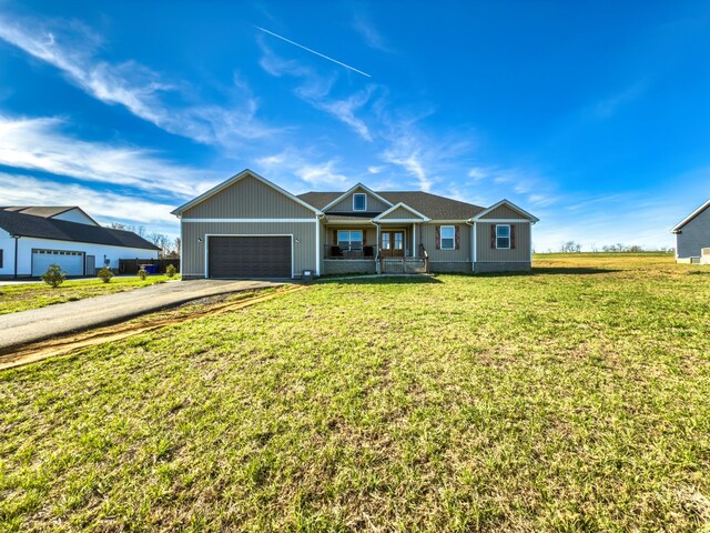 5113 Highland Lick Rd, Lewisburg, KY 42256 - single story home with driveway, an attached garage, and a front lawn