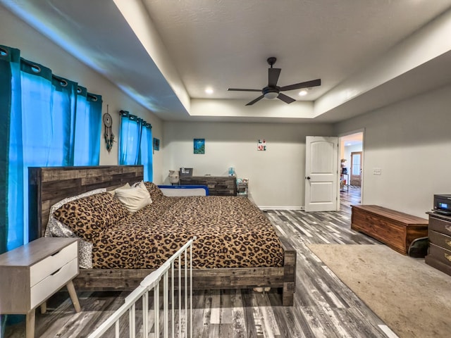 5113 Highland Lick Rd, Lewisburg, KY 42256 - bedroom with a tray ceiling, baseboards, wood finished floors, and recessed lighting