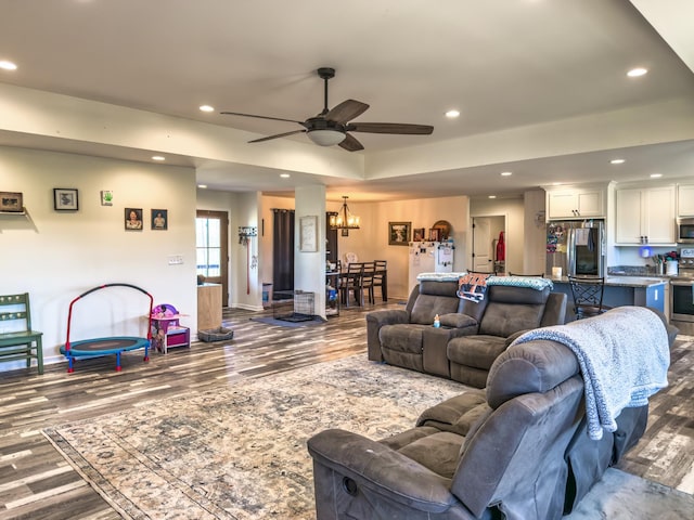 5113 Highland Lick Rd, Lewisburg, KY 42256 - living room with wood finished floors, ceiling fan with notable chandelier, baseboards, and recessed lighting