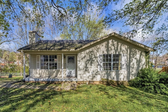 106 Hampton Dr, La Vergne, TN 37086 - single story home featuring a chimney, a front lawn, and a porch