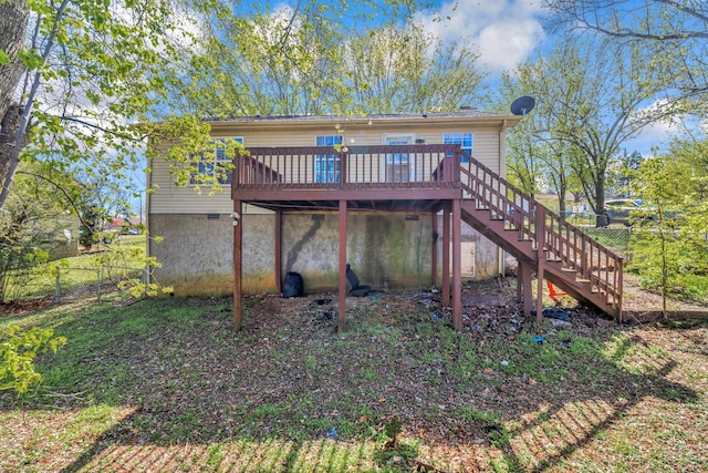 106 Hampton Dr, La Vergne, TN 37086 - back of house with stairs, fence, and a wooden deck