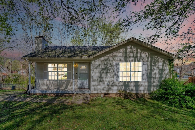 106 Hampton Dr, La Vergne, TN 37086 - view of front of home with a chimney, a front lawn, and a porch