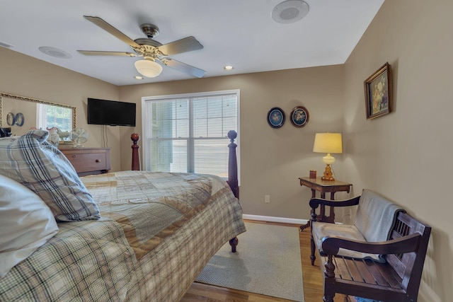 9395 Greenbriar Rd, Waverly, TN 37185 - bedroom with baseboards, wood finished floors, and ceiling fan