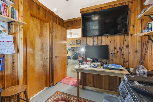9395 Greenbriar Rd, Waverly, TN 37185 - home office with a ceiling fan and wooden walls