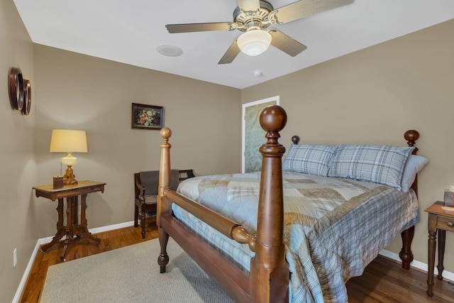 9395 Greenbriar Rd, Waverly, TN 37185 - bedroom with wood finished floors, baseboards, and ceiling fan