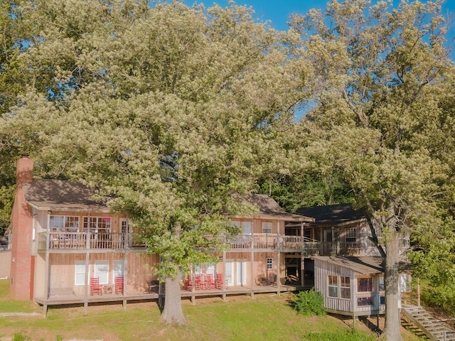 9395 Greenbriar Rd, Waverly, TN 37185 - rear view of house featuring a chimney and a deck