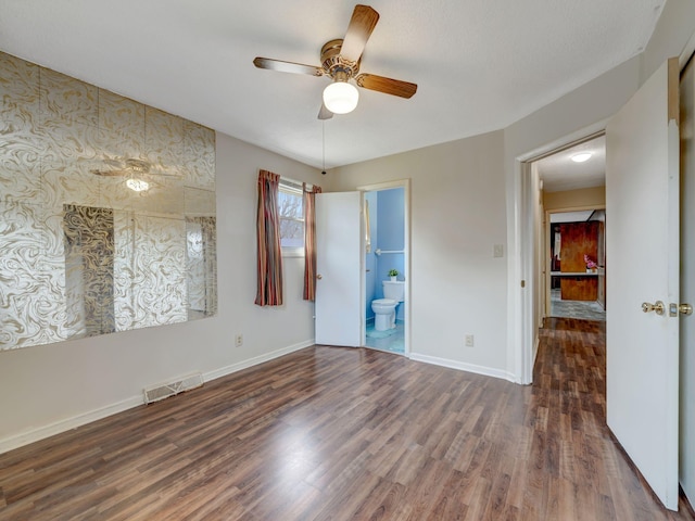 440 Appleton Dr, Clarksville, TN 37042 - unfurnished bedroom featuring wood finished floors, ensuite bath, baseboards, visible vents, and ceiling fan