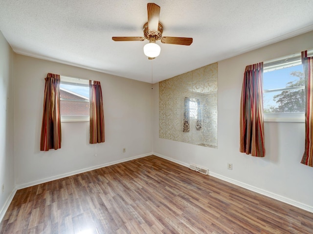 440 Appleton Dr, Clarksville, TN 37042 - spare room featuring baseboards, visible vents, wood finished floors, and a textured ceiling