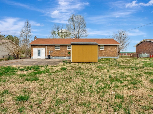440 Appleton Dr, Clarksville, TN 37042 - back of house with fence, a chimney, a patio, and brick siding