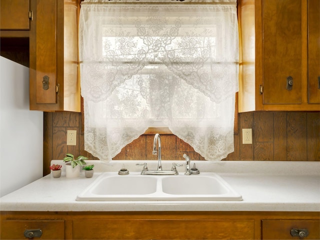 440 Appleton Dr, Clarksville, TN 37042 - kitchen with brown cabinets, light countertops, and a sink