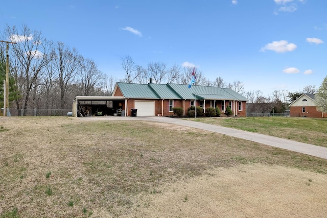 view of front of house featuring a front lawn, a garage, fence, and metal roof