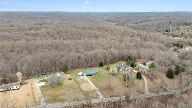 drone / aerial view featuring a forest view and a rural view