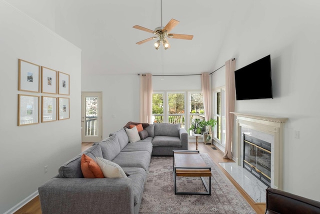6525 Chessington Dr, Nashville, TN 37221 - living area featuring high vaulted ceiling, wood finished floors, ceiling fan, and a wealth of natural light