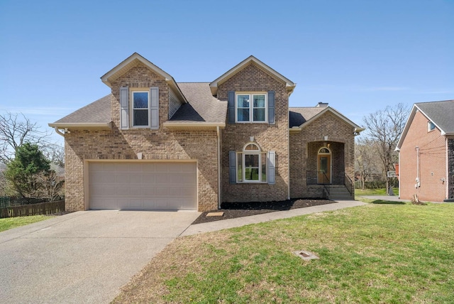 6525 Chessington Dr, Nashville, TN 37221 - traditional home with a shingled roof, driveway, a front yard, and brick siding