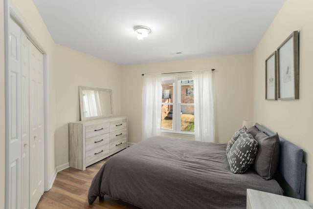 6525 Chessington Dr, Nashville, TN 37221 - bedroom featuring baseboards and wood finished floors