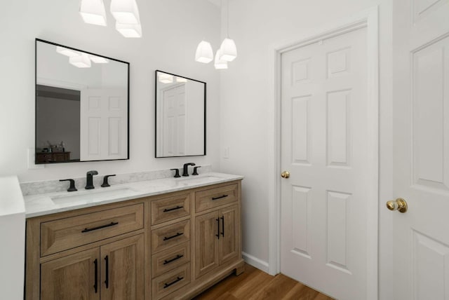 6525 Chessington Dr, Nashville, TN 37221 - bathroom with double vanity, wood finished floors, and a sink
