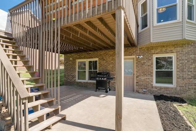 6525 Chessington Dr, Nashville, TN 37221 - view of patio featuring grilling area and stairway