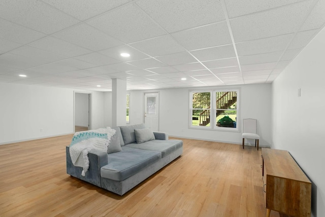 6525 Chessington Dr, Nashville, TN 37221 - living room featuring baseboards, light wood-style flooring, a drop ceiling, and recessed lighting