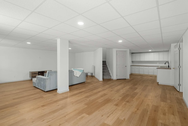 6525 Chessington Dr, Nashville, TN 37221 - finished basement featuring light wood finished floors, stairs, recessed lighting, a sink, and a drop ceiling