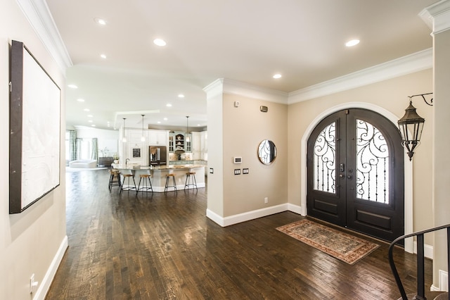 817 Burton Point Rd, Mount Juliet, TN 37122 - foyer featuring arched walkways, french doors, dark wood-type flooring, and crown molding