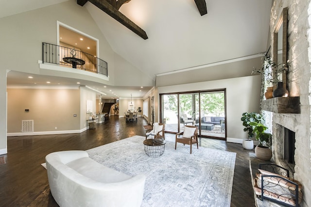 817 Burton Point Rd, Mount Juliet, TN 37122 - living room featuring high vaulted ceiling, baseboards, dark wood-style floors, visible vents, and a fireplace