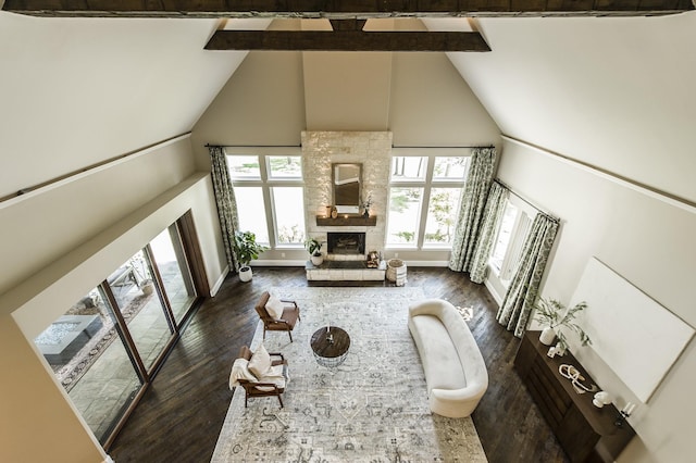 817 Burton Point Rd, Mount Juliet, TN 37122 - living room with beamed ceiling, high vaulted ceiling, wood finished floors, and a fireplace with raised hearth