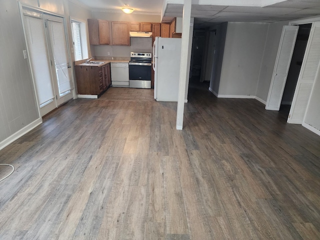 906 Edwards St, Madisonville, KY 42431 - kitchen featuring under cabinet range hood, dark wood-style floors, a sink, and white appliances