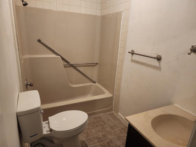 906 Edwards St, Madisonville, KY 42431 - bathroom featuring bathing tub / shower combination, toilet, vanity, and tile patterned floors